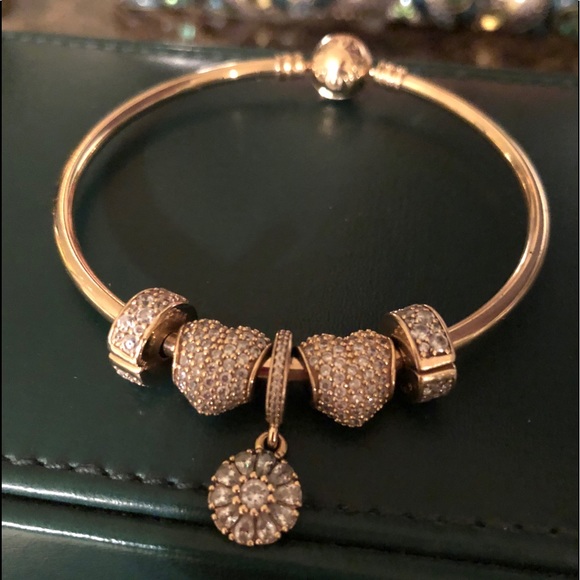 Pandora Jewelry - 14kt Gold Pandora bangle with gold charms